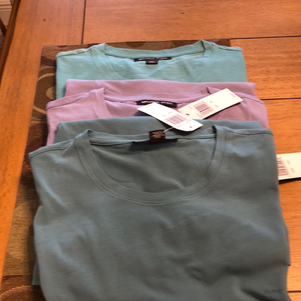 3 Michael kors polo shirts. Original price $50 each. All three $60